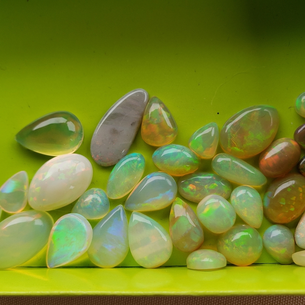 Real fire opal cabs  30 total